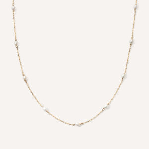 choker minimalista feita à mão em ouro 18k com pequenas pérolas em torno de toda a corrente