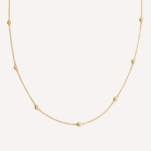 Choker minimalista feita a mão em ouro 18k com sete diamantes em sua volta