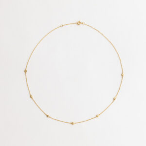 Choker minimalista feita a mão em ouro 18k com sete diamantes em sua volta