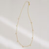 colar em ouro 18k com corrente tipo cartier e pingentes com diamantes de 0,03ct, sobre fundo branco