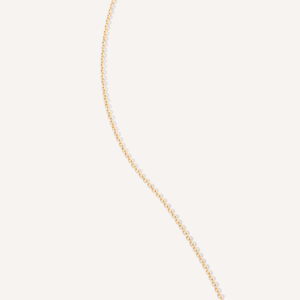 imagem dos elos da corrente cartier slim fina em ouro amarelo 18k