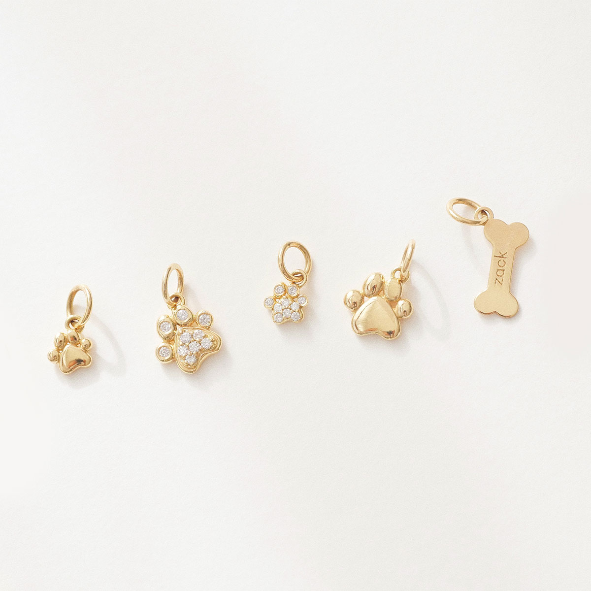 pingentes de patinhas de cachorro ouro 18k minimalista