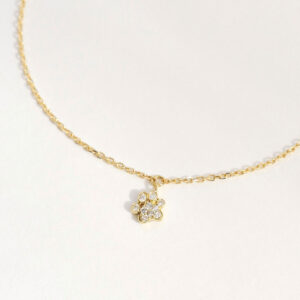 pulseira em ouro 18k com patinha de cachorro com brilhantes delicada